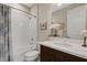 Cozy bathroom showcasing a shower-tub combo, decorative shower curtain, vanity, and modern fixtures at 3325 Azurite Way, Bradenton, FL 34211