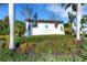 Elegant community sign for Indigo at Lakewood Ranch with lush landscaping at 3325 Azurite Way, Bradenton, FL 34211