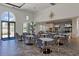 Bright dining area has tables, chairs and fixtures, offering space for meals and socializing at 3325 Azurite Way, Bradenton, FL 34211