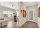 Bright office space with large window, desk, and seating area featuring modern decor at 3325 Azurite Way, Bradenton, FL 34211
