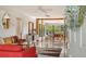 Bright and airy living room featuring modern decor, stylish furnishings, and large windows at 603 Barnes Pkwy, Nokomis, FL 34275