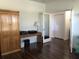 Spacious office with wood floors, offering storage and natural light, perfect for a home workspace at 15079 Wichita Rd, Port Charlotte, FL 33981