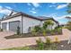 Beautiful single-Gathering home with an attached two-car garage, manicured landscaping, and a paved walkway at 3016 Formia Ct, Bradenton, FL 34211