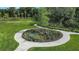 Scenic park with winding paths, lush greenery, and garden spaces at 3016 Formia Ct, Bradenton, FL 34211