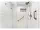 Modern bathroom featuring sleek tile and a glass-enclosed shower at 3500 El Conquistador Pkwy # 119, Bradenton, FL 34210