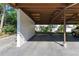 Designated covered parking space offering protection from the elements, with ample space for vehicles at 3500 El Conquistador Pkwy # 119, Bradenton, FL 34210