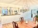 Dining room area open to the kitchen, creating an inviting space for entertaining at 3500 El Conquistador Pkwy # 119, Bradenton, FL 34210