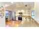 Modern kitchen with stainless steel appliances, granite countertops, and ample natural light from a window at 3500 El Conquistador Pkwy # 119, Bradenton, FL 34210
