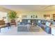 Inviting living room with comfortable seating and charming decor accents at 3500 El Conquistador Pkwy # 119, Bradenton, FL 34210