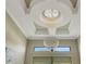 Statement chandelier enhancing the modern interior design at 5341 Greenbrook Dr, Sarasota, FL 34238
