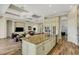 Open-concept kitchen and living area featuring a granite island with bar seating, perfect for socializing at 5341 Greenbrook Dr, Sarasota, FL 34238