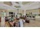 Open-concept living space seamlessly blending living, dining, and kitchen areas, ideal for modern living at 5341 Greenbrook Dr, Sarasota, FL 34238
