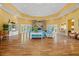 Spacious clubhouse with hardwood floors, a fireplace, and comfortable seating areas for residents at 5711 Soldier Cir # 204, Sarasota, FL 34233