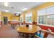 Spacious game room with billiard table and seating area for entertaining guests at 5711 Soldier Cir # 204, Sarasota, FL 34233