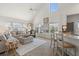 Inviting living room featuring bright lighting, neutral decor, and a view at 5711 Soldier Cir # 204, Sarasota, FL 34233
