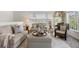 Inviting living room space, neutral color palette, and sophisticated decor at 5711 Soldier Cir # 204, Sarasota, FL 34233