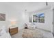 Bright bedroom with a window providing natural light and neutral decor at 6669 Windjammer Pl, Lakewood Ranch, FL 34202