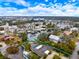 Aerial view showcasing the home's location within a waterfront community, highlighting boating access and nearby amenities at 121 Holly Ave, Sarasota, FL 34243