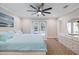 Bedroom with carpet, ceiling fan, and access to the outdoors, creating a relaxing retreat at 121 Holly Ave, Sarasota, FL 34243