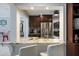 Updated kitchen with granite countertops, stainless steel appliances, and ample cabinet space at 121 Holly Ave, Sarasota, FL 34243