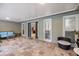 Spacious covered lanai with comfortable seating and access to indoor living spaces at 121 Holly Ave, Sarasota, FL 34243