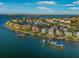 Beautiful coastal community featuring waterfront homes, boat docks, and lush tropical landscaping at 12917 42Nd W Ter, Cortez, FL 34215