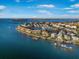 Beautiful coastal community featuring waterfront homes, boat docks, and tropical landscaping at 12917 42Nd W Ter, Cortez, FL 34215