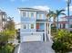 Inviting two-story home with a paved driveway and a two-car garage at 12917 42Nd W Ter, Cortez, FL 34215