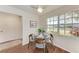 Cozy dining area featuring a wood table with seating for four and a large window at 20032 Sancraft Ave, Port Charlotte, FL 33954