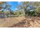 Community playground surrounded by mature trees, offering a serene and fun environment for outdoor recreation at 20032 Sancraft Ave, Port Charlotte, FL 33954