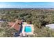 Aerial of a sparkling community pool and lounge area, providing a refreshing escape for residents at 20032 Sancraft Ave, Port Charlotte, FL 33954