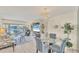 Open living room and dining area with a view of the waterway at 4350 Chatham Dr # E106, Longboat Key, FL 34228