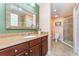 Bathroom featuring double vanity, tiled shower, and neutral color palette at 559 Bahia Beach Blvd, Ruskin, FL 33570