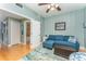 Comfortable living room featuring hardwood floors, a couch, and decor at 559 Bahia Beach Blvd, Ruskin, FL 33570