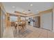 An eat-in kitchen with stainless appliances, tile floors, and an adjacent breakfast nook at 6334 Grand Oak Cir # 201, Bradenton, FL 34203