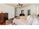 Spacious bedroom showing a bed, dresser, and ensuite bathroom at 6814 Willowshire Way, Bradenton, FL 34212