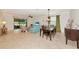 Open floor plan featuring a dining room, living room and access to the lanai for indoor outdoor living at 6814 Willowshire Way, Bradenton, FL 34212
