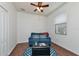 Cozy sitting room with a blue couch and natural light at 6814 Willowshire Way, Bradenton, FL 34212