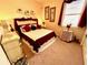 Cozy main bedroom with plush bedding and elegant decor at 7619 Teal Trace, Bradenton, FL 34203