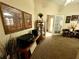 Hallway area with built-in desk and cabinetry, creating a practical and organized workspace at 7619 Teal Trace, Bradenton, FL 34203