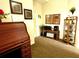 Hallway area with built-in desk and cabinetry, creating a practical and organized workspace at 7619 Teal Trace, Bradenton, FL 34203
