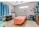 Bedroom with tile floor, closet, and natural light at 8059 Strasse Blvd, Punta Gorda, FL 33982