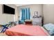 Bedroom with tile floor, closet, and natural light at 8059 Strasse Blvd, Punta Gorda, FL 33982
