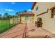 View of the backyard patio area with a built-in grill, perfect for outdoor entertaining at 8059 Strasse Blvd, Punta Gorda, FL 33982