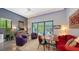 Cozy living area showcases natural light, stylish furniture, and seamless access to outdoor living space at 2434 Wood St, Sarasota, FL 34237
