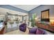 Spacious living and kitchen area with modern white cabinetry and comfortable seating for relaxation at 2434 Wood St, Sarasota, FL 34237