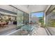 Outdoor patio with open view and comfortable seating arrangement next to the kitchen at 2434 Wood St, Sarasota, FL 34237