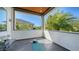 Inviting porch area with bright light and palm tree views at 2434 Wood St, Sarasota, FL 34237