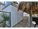 Metal shed next to a tiki hut and landscaping stones at 2762 W Vina Del Mar Blvd, St Pete Beach, FL 33706