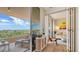 Relaxing balcony boasts comfortable seating, a scenic view, and seamless indoor/outdoor living at 3060 Grand Bay Blvd # 154, Longboat Key, FL 34228